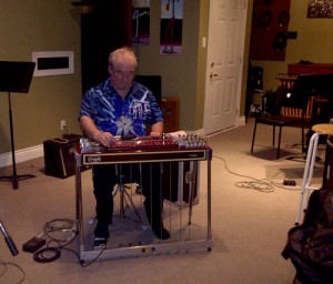 Mike Holynaty on the slide guitar